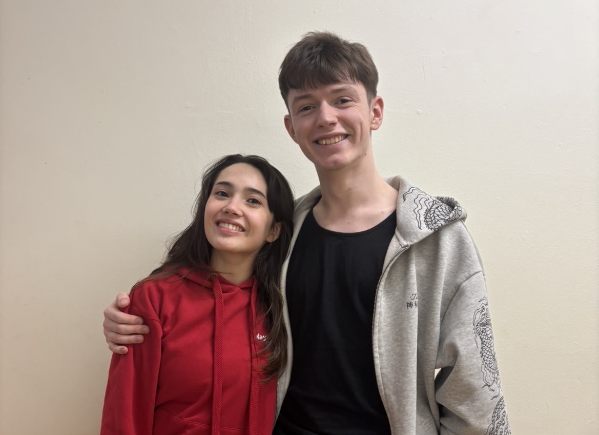 Martin and Maya photographed hugging each other and similing